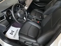 2022 Toyota Corolla 1.8L Hybrid E-CVT, белый — фото 6