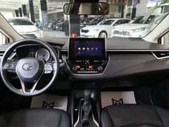 2022 Toyota Corolla 1.8L Hybrid E-CVT, белый — фото 12