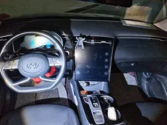 2023 Hyundai Tucson L 1.5T AT 2WD LUX Premium, белый — фото 12