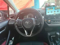 2021 Toyota Corolla TNGA 1.5L CVT GR SPORT, белый — фото 6