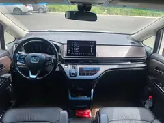 2022 Honda Odyssey 2.0L e:HEV, белый — фото 9