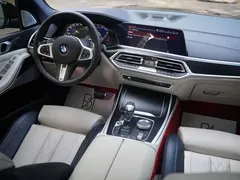 2021 BMW X7 xDrive40i M, синий — фото 17