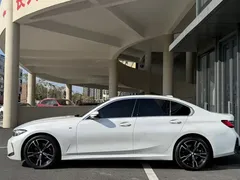 2023 BMW 3 Series 325i M, белый — фото 11