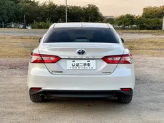 2021 Toyota Camry Hybrid 2.5HGVP Advanced, белый — фото 4