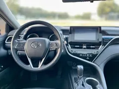 2021 Toyota Camry Hybrid 2.5HGVP Advanced, белый — фото 14