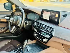 2023 BMW 5 Series 530Li Leading M Sport Package, белый — фото 6