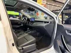 2023 Toyota Corolla 1.8L Smart Hybrid Elite, белый — фото 6