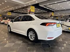 2023 Toyota Corolla 1.8L Smart Hybrid Elite, белый — фото 12