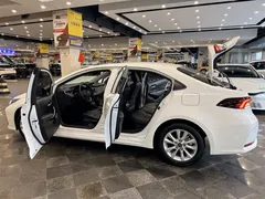 2023 Toyota Corolla 1.8L Smart Hybrid Elite, белый — фото 28