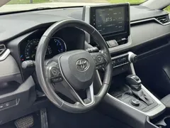 2021 Toyota RAV4 Hybrid 2.5L E-CVT 4WD PLUS, белый — фото 8