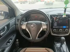 2021 Nissan Tiida 1.6L CVT, белый — фото 11