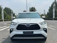 2022 Toyota Highlander Hybrid 2.5L 4WD Premium 7-seat, белый — фото 1