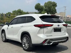 2022 Toyota Highlander Hybrid 2.5L 4WD Premium 7-seat, белый — фото 6