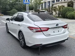2021 Toyota Camry Hybrid 2.5HG Luxury, белый — фото 3