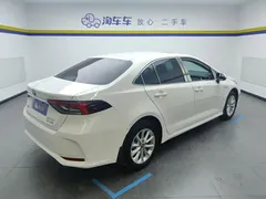 2021 Toyota Corolla Hybrid 1.8L E-CVT Elite, белый — фото 3