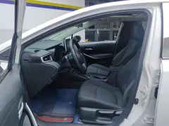 2021 Toyota Corolla Hybrid 1.8L E-CVT Elite, белый — фото 9