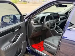2022 Toyota Highlander Hybrid 2.5L 4WD Premium 7, синий — фото 9
