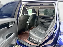 2022 Toyota Highlander Hybrid 2.5L 4WD Premium 7, синий — фото 10
