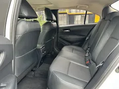 2021 Toyota Corolla 1.2T S-CVT Luxury, белый — фото 16