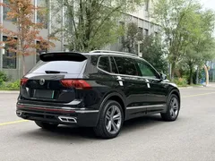 2022 Volkswagen Tiguan L 430PHEV, чёрный — фото 7