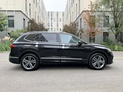 2022 Volkswagen Tiguan L 430PHEV, чёрный — фото 10