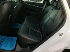 2021 Hyundai Tucson L 1.5T DCT LUX Premium, белый — фото 11