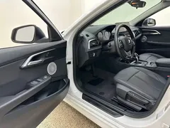 2022 BMW 1 Series 1 120i M Sport, белый — фото 23