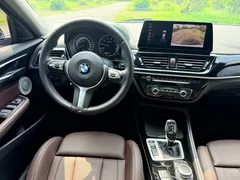 2021 BMW 1 Series 125i M Sport Night Edition, белый — фото 10