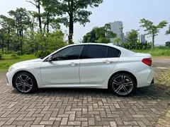 2021 BMW 1 Series 125i M Sport Night Edition, белый — фото 15