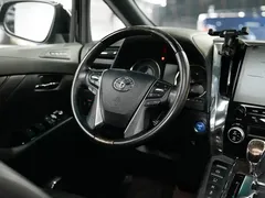2021 Toyota Alphard Hybrid 2.5L Premium, чёрный — фото 30