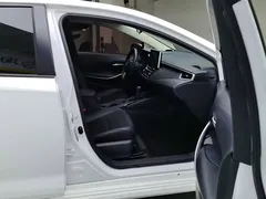 2021 Toyota Corolla 1.8L E-CVT, белый — фото 8