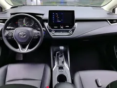 2021 Toyota Corolla 1.8L E-CVT, белый — фото 12
