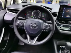 2021 Toyota Corolla 1.8L E-CVT, белый — фото 15