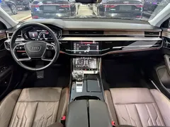 2019 Audi A8 Plus A8L 55 TFSI quattro, чёрный — фото 7