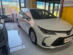 2021 Toyota Corolla 1.8L E-CVT, белый — фото 2
