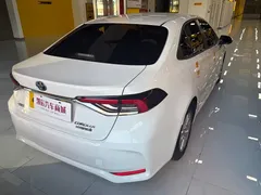 2021 Toyota Corolla 1.8L E-CVT, белый — фото 4