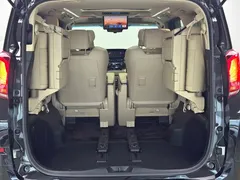 2021 Toyota Alphard Hybrid 2.5L Premium, чёрный — фото 41