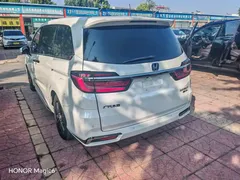 2024 Honda Odyssey 2.0L e:HEV, белый — фото 4