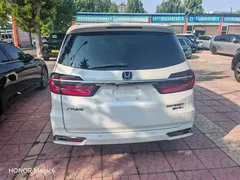 2024 Honda Odyssey 2.0L e:HEV, белый — фото 5