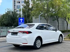 2021 Toyota Corolla 1.2T S-CVT, белый — фото 7
