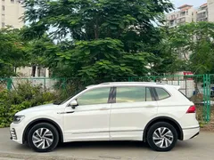 2021 Volkswagen Tiguan L 430PHEV Premium, белый — фото 3