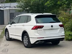 2021 Volkswagen Tiguan L 430PHEV Premium, белый — фото 4
