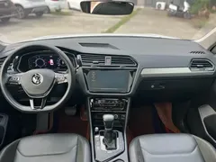2021 Volkswagen Tiguan L 430PHEV Premium, белый — фото 7