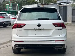 2021 Volkswagen Tiguan L 430PHEV Premium, белый — фото 9