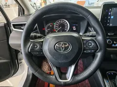 2021 Toyota Corolla TNGA 1.5L CVT GR Sport, белый — фото 7
