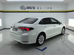 2021 Toyota Corolla 1.8L E-CVT, белый — фото 3
