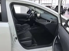 2021 Toyota Corolla 1.8L E-CVT, белый — фото 8