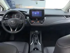 2021 Toyota Corolla 1.8L E-CVT, белый — фото 12
