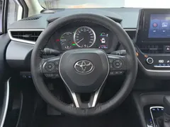 2021 Toyota Corolla 1.8L E-CVT, белый — фото 15