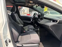 2022 Toyota Levin Hybrid 1.8H E-CVT Luxury, белый — фото 8